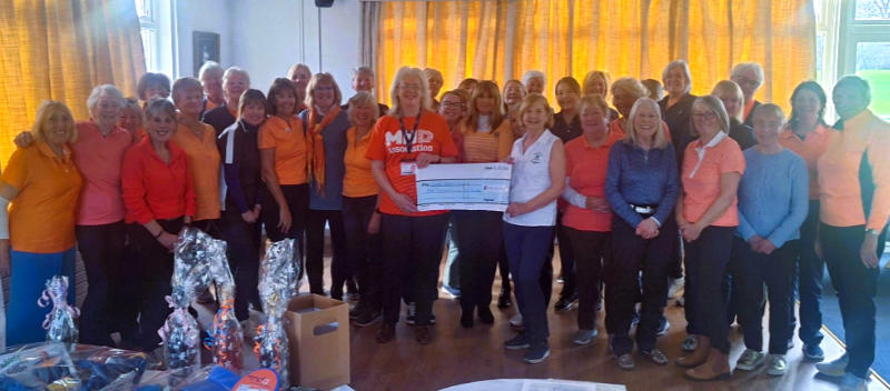 Wirral MNDA Group presented with cheque for over £4,000